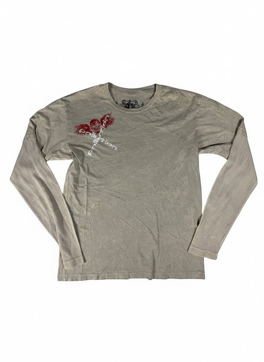 Throwback Rack taupe long sleeve shirt with distressed graphic of a winged skull and "Pollution" text. Features a mesh underlayer on the sleeves.